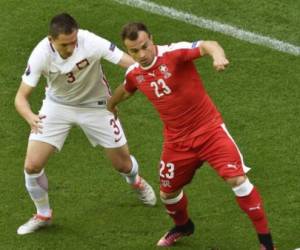 Suiza y Polonia juegan alargue en inicio de octavos de Euro 2016. Foto AFP