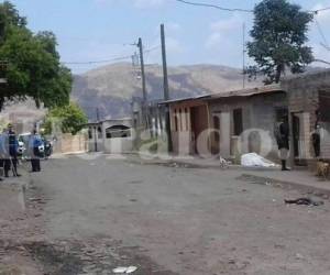 Otra mujer fue asesinada este viernes en la colonia Divino Paraíso, al noroccidente de la capital de Honduras, a menos de una semana que hallaran muerta a una fémina en el cementerio de la zona, foto: Alex Pérez / EL HERALDO.