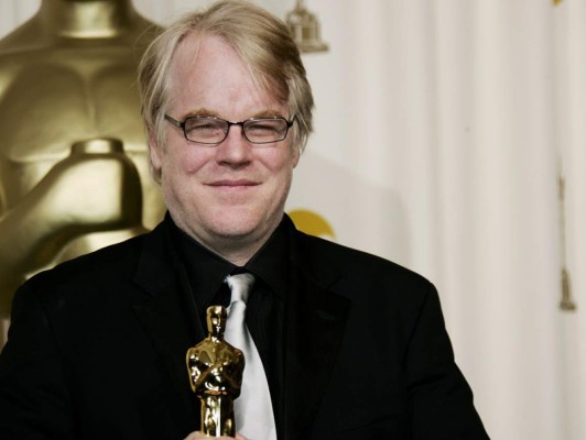 FILE - In a Sunday, March 5, 2006, file photo, actor Philip Seymour Hoffman poses with the Oscar he won for best actor for his work in 'Capote' at the 78th Academy Awards, in Los Angeles. Police say Hoffman has been found dead in his apartment. Sunday Feb. 2014. HE WAS 46.(AP Photo/Kevork Djansezian, File)