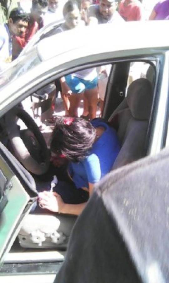 Asesinan a pareja dentro de un vehículo en La Ceiba