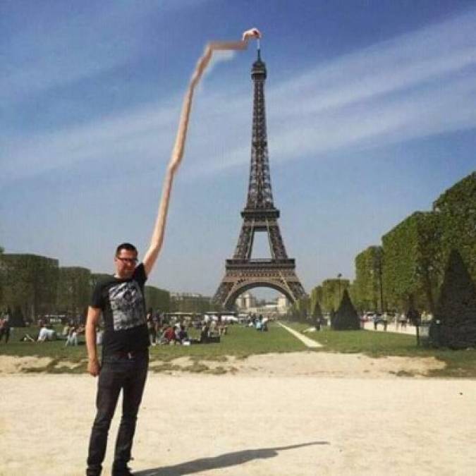 Los 'photoshops' más divertidos del hombre que intentó tomarse una foto tocando la Torre Eiffel