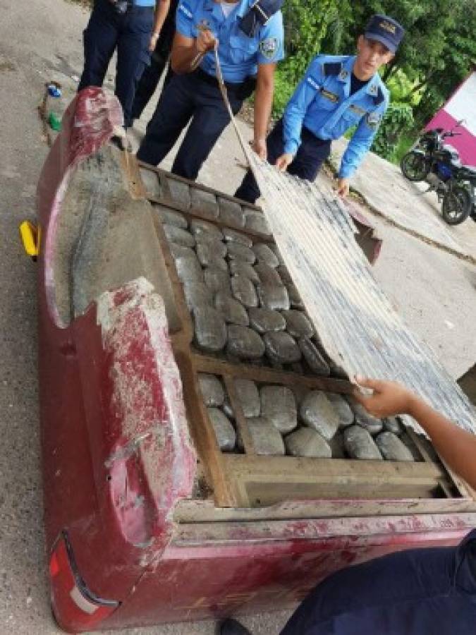 Caen dos hondureños que transportaban droga en compartimentos falsos