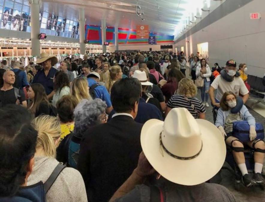 Suspensión de vuelos y aeropuertos llenos de viajeros ante alarma por coronavirus (FOTOS)