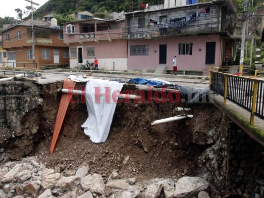 FOTOS: Lluvias provocan severos daños en vivendas y carreteras de la capital