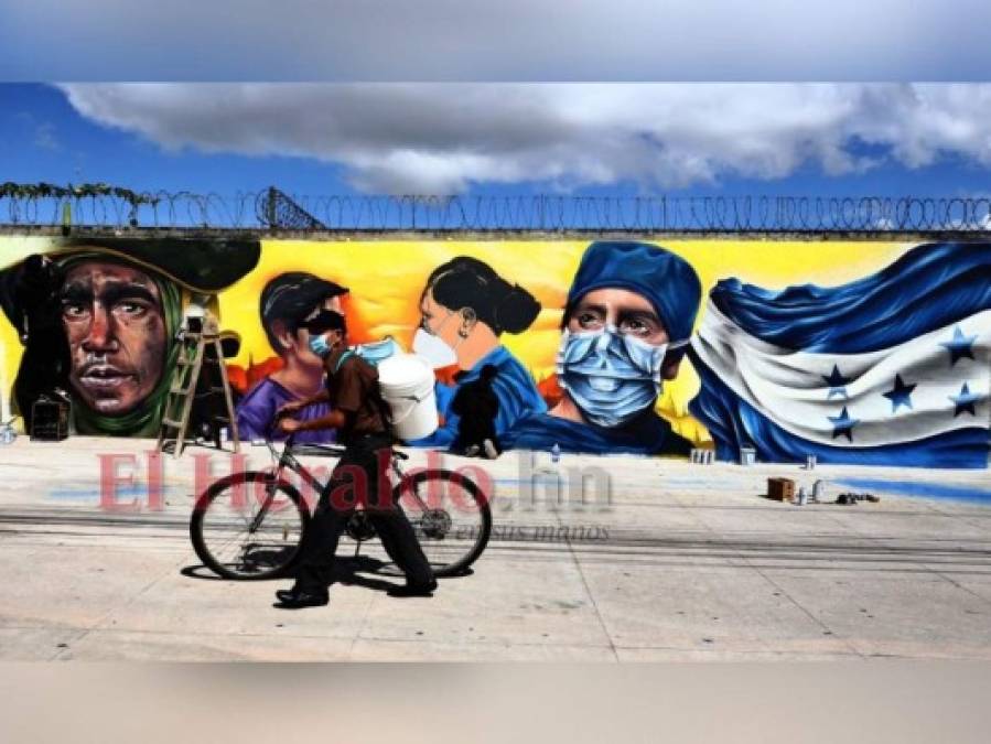 FOTOS: Hermanos muestran su arte en honor a los trabajadores que luchan en primera línea