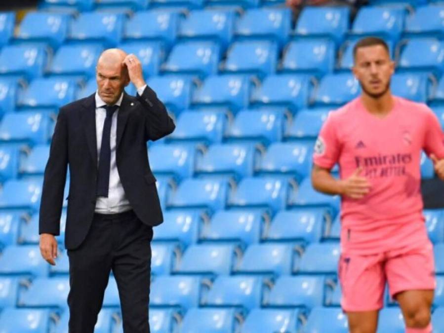 Rostros de decepción de madridistas tras la eliminación de la Champions