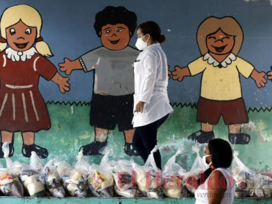 Entre sonrisas, trabajo y miradas de incertidumbre, niñez hondureña celebra su día