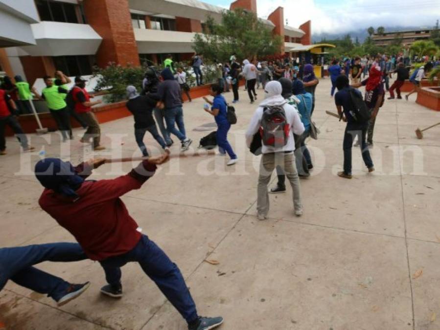 Las diez fotos más impactantes de la batalla entre universitarios y seguridad privada en la UNAH