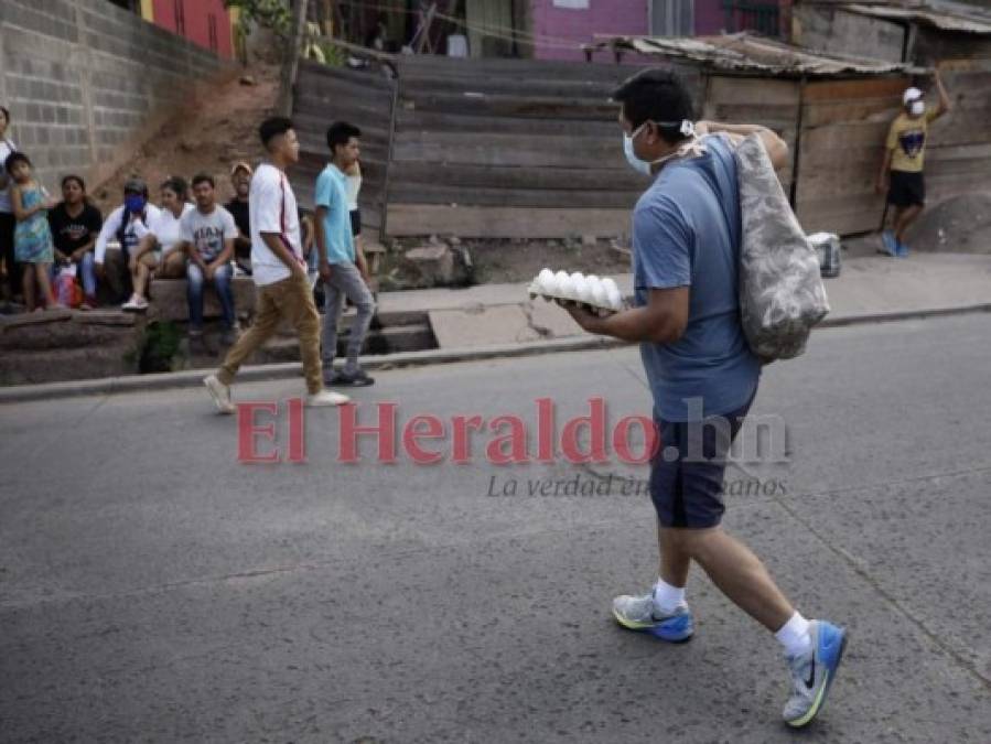 FOTOS: Ventas ambulantes, protestas y desalojos, hondureños no acatan medidas