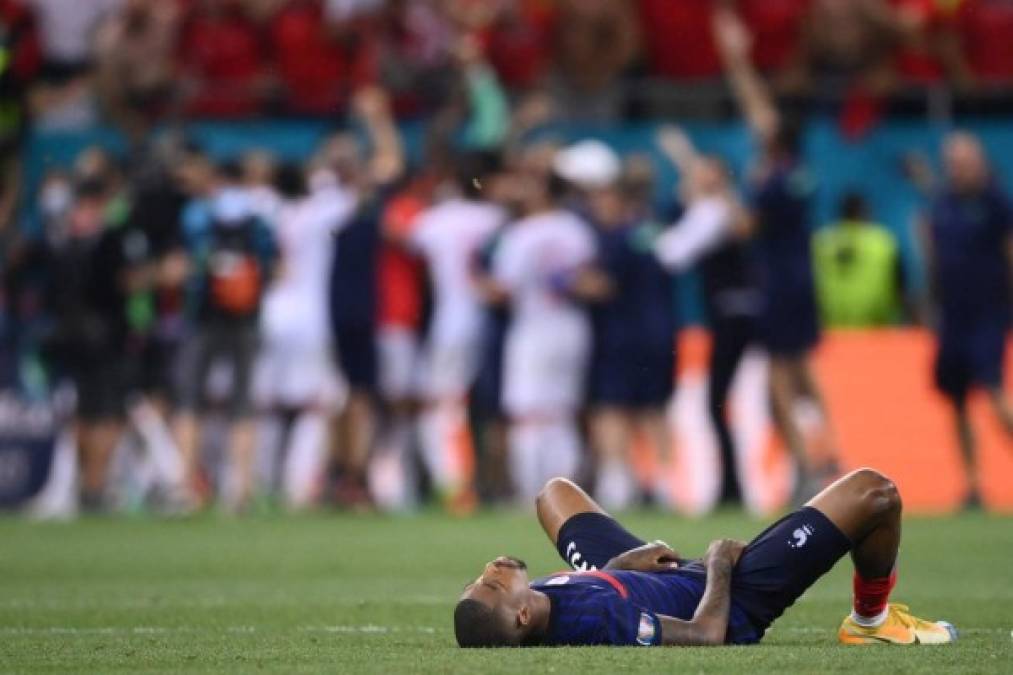 Tristes rostros de la afición y jugadores de Francia tras quedar eliminados de la Eurocopa