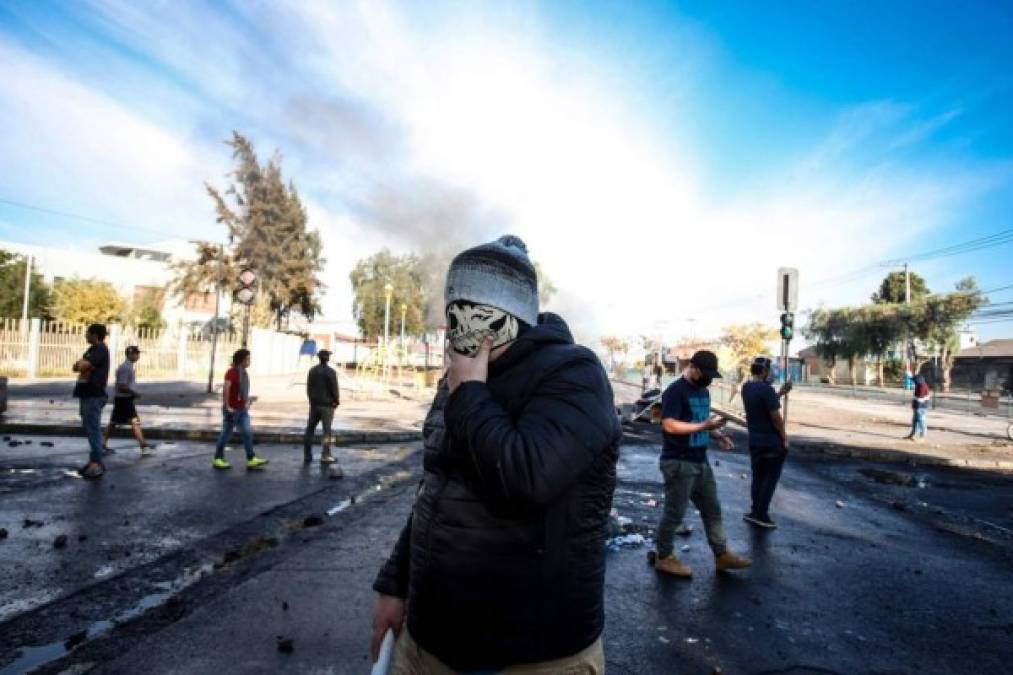 Desorden y disparos en protesta en Chile en medio de la pandemia (FOTOS)