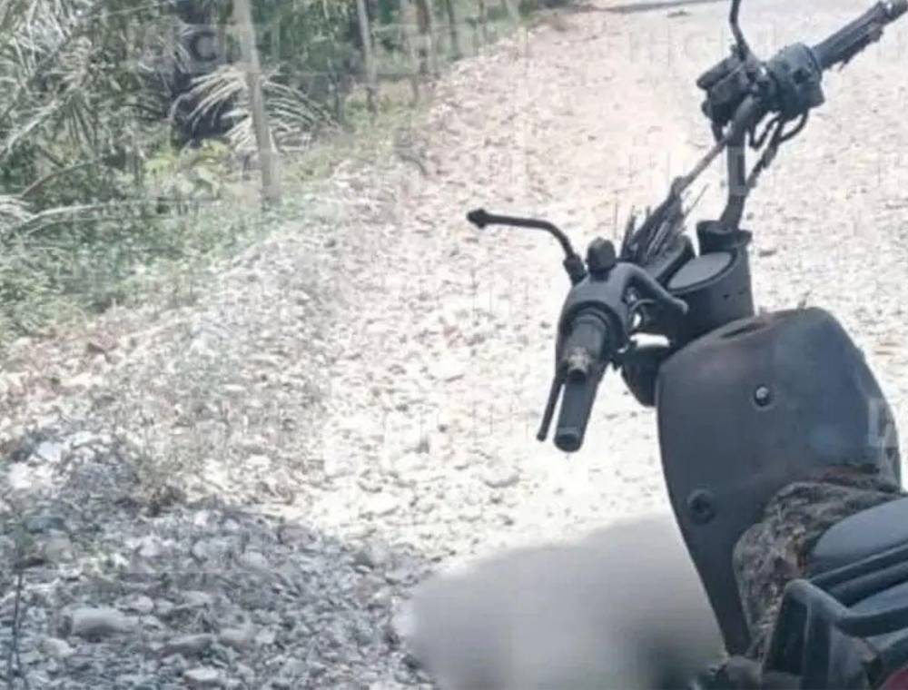 Carbonizado y con al menos 12 disparos: así hallaron a guardia asesinado en Atlántida