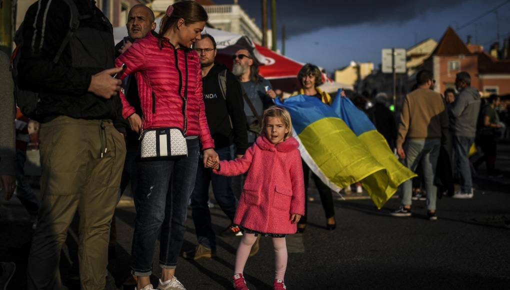 “No podemos volver”: el drama de los primeros refugiados ucranianos en Alemania (Fotos)
