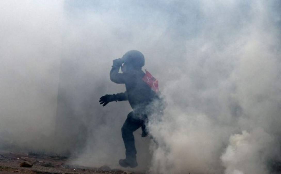 Diez imágenes de los disturbios y protestas en la capital de Honduras