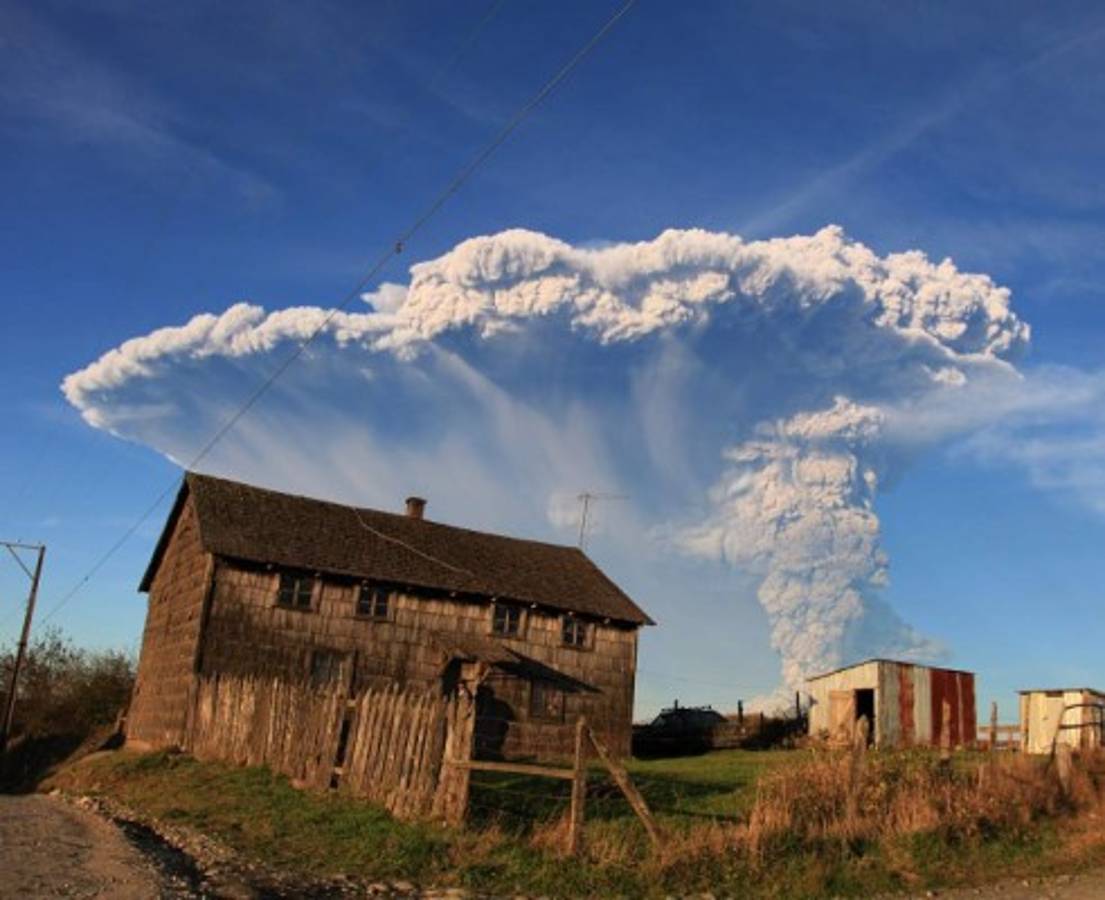 PAHOA, HI - MAY 20: A steam plume rises as lava enters the Pacific Ocean, after flowing to the water from a Kilauea volcano fissure, on Hawaii's Big Island on May 20, 2018 near Pahoa, Hawaii. Officials are concerned that 'laze', a dangerous product produced when hot lava hits cool ocean water, will affect residents. Laze, a word combination of lava and haze, contains hydrochloric acid steam along with volcanic glass particles. Mario Tama/Getty Images/AFP== FOR NEWSPAPERS, INTERNET, TELCOS & TELEVISION USE ONLY ==