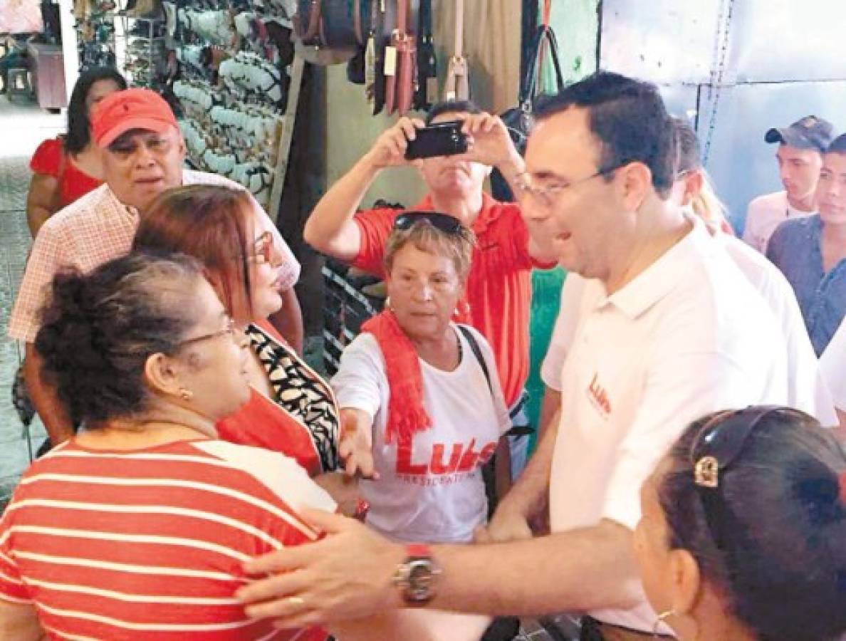 Luis Zelaya escucha a vendedores de mercados de San Pedro Sula