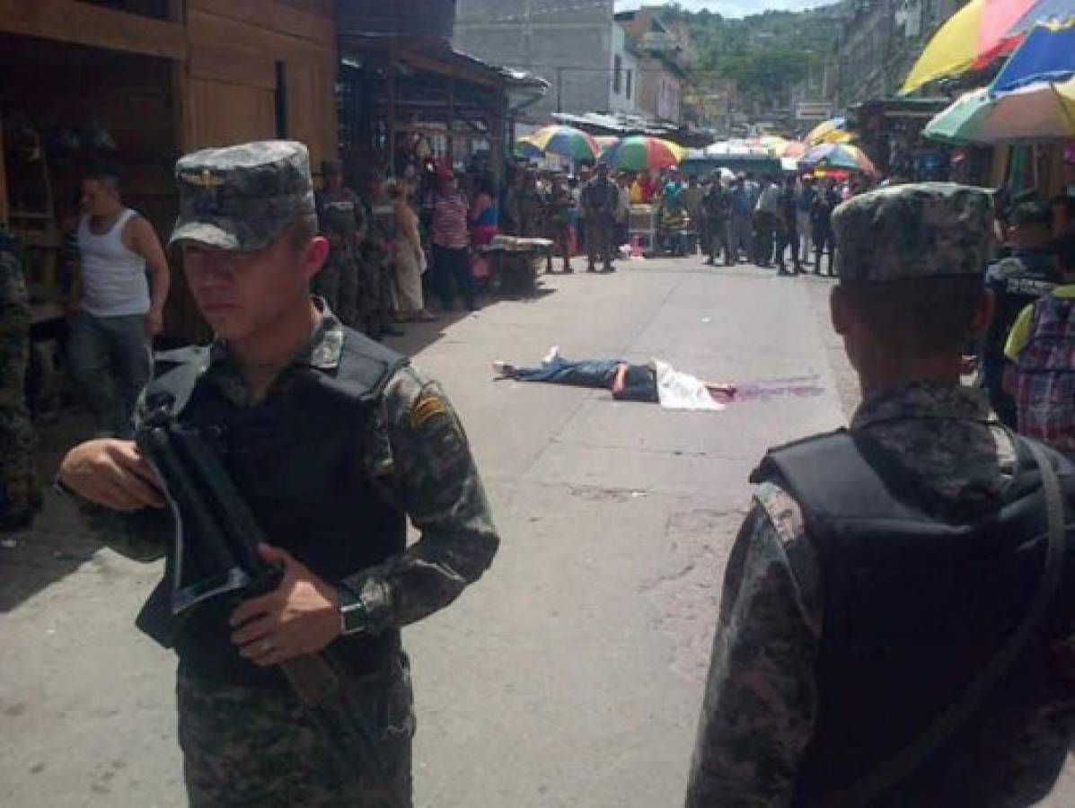 Tras la pista de asesinos de joven en mercado de Comayagüela