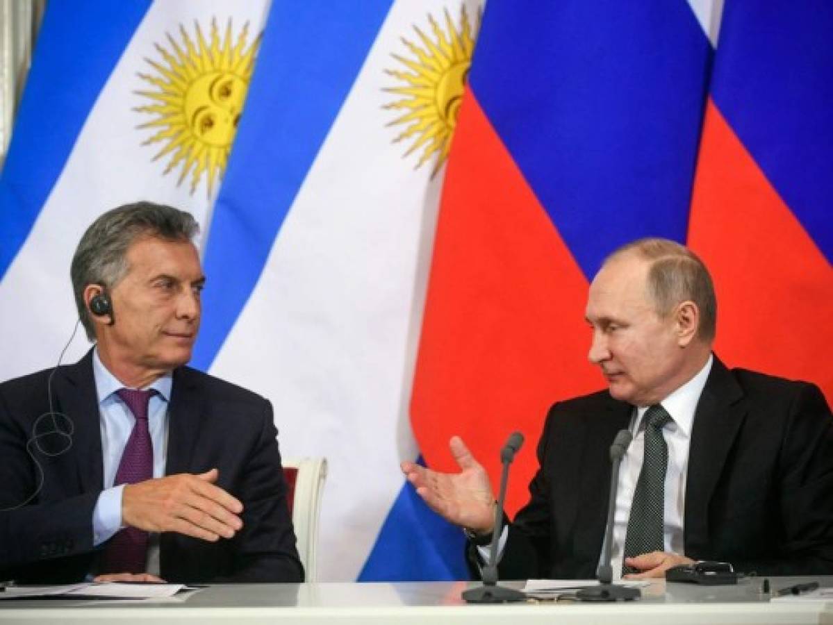 'Dios y Messi dirán si podemos ganar el Mundial', dice Macri en Rusia ante Vladimir Putin