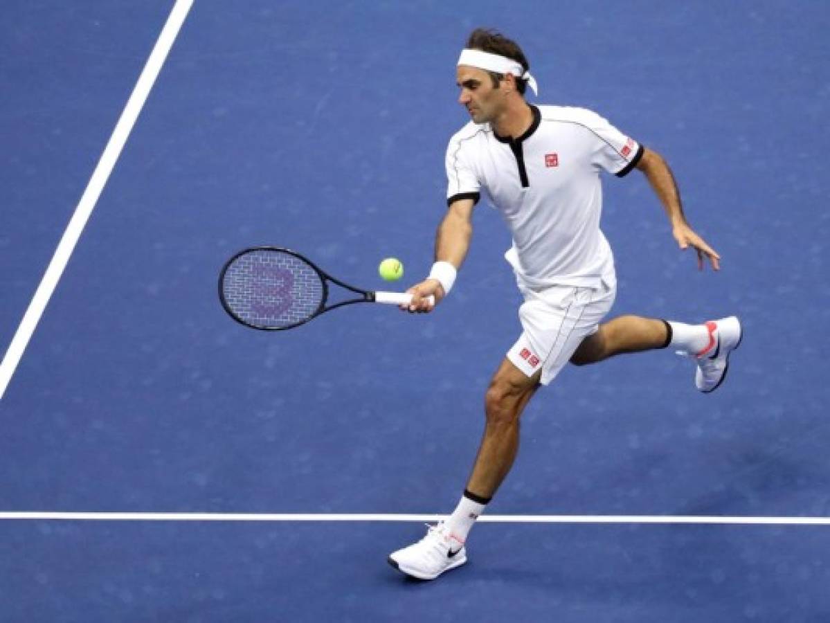 NEW YORK, NEW YORK - AUGUST 28: Roger Federer of Switzerland returns a shot during his Men's Singles second round match against Damir Dzumhur of Bosnia and Herzegovina on day three of the 2019 US Open at the USTA Billie Jean King National Tennis Center on August 28, 2019 in the Flushing neighborhood of the Queens borough of New York City. Katharine Lotze/2019 Getty Images/AFP