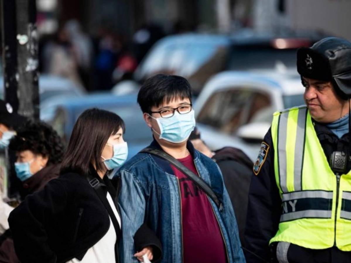 China registra otros 125 casos de coronavirus, el número diario más bajo