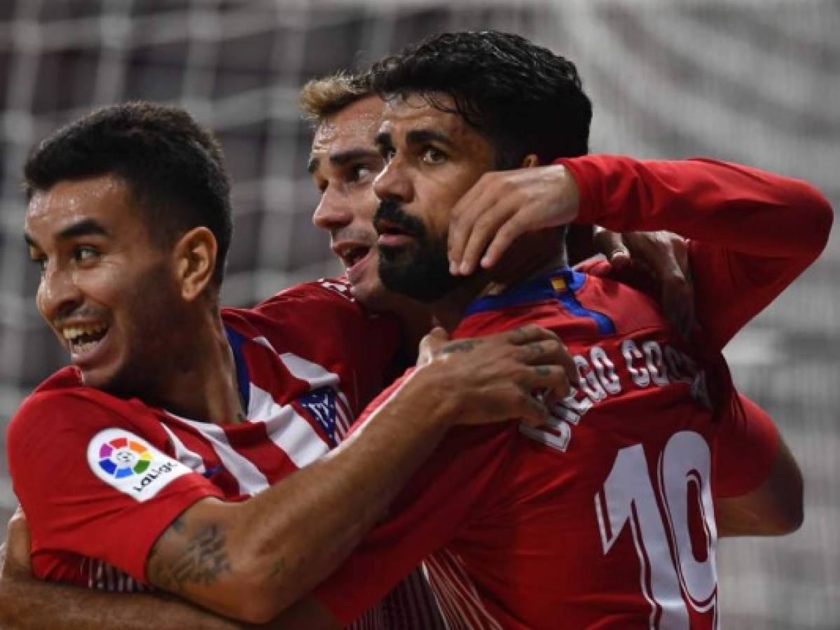 Atlético de Madrid golea 3-0 al Huesca y se crece para el derbi ante el Real Madrid
