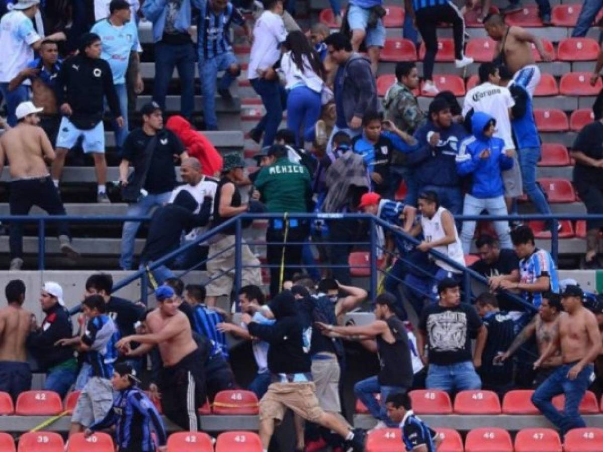 Supenden el Querétaro vs Atlético San Luis por violencia e invasión a la cancha