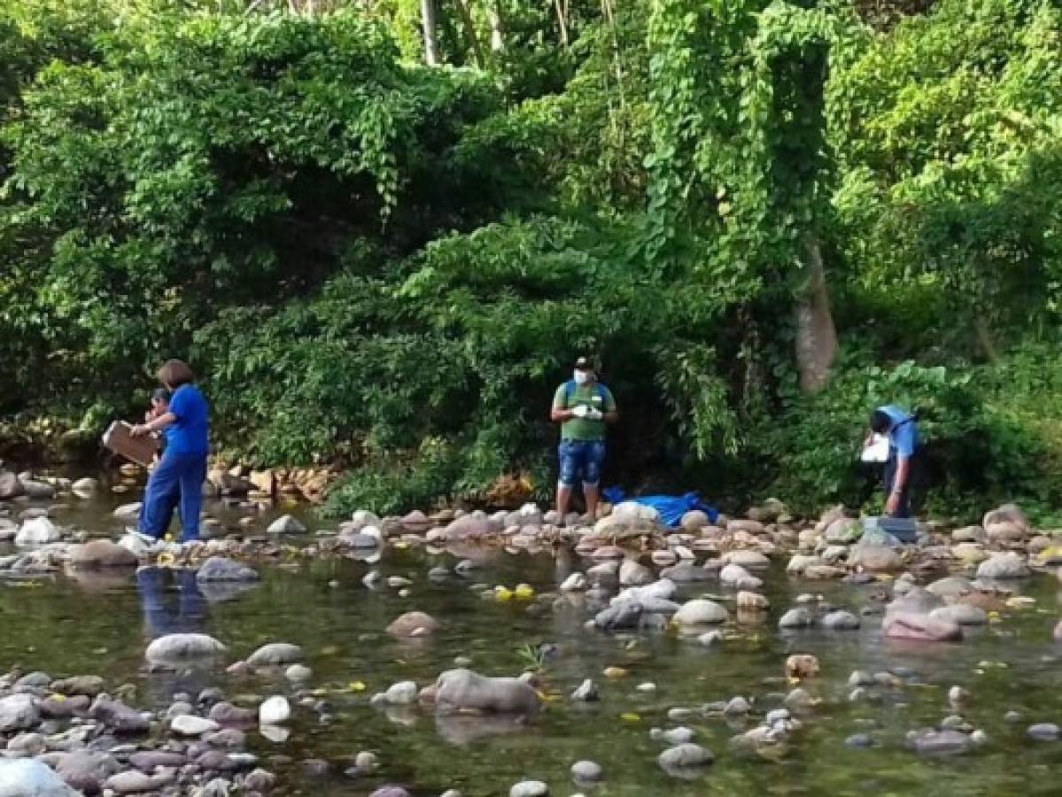 Semienterrado y con signos de tortura hallan cuerpo en el Río Danto de La Ceiba