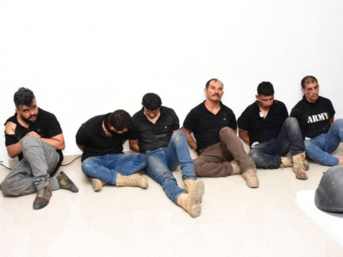 Algunos de los capturados acusados por el magnicidio contra Moise. Foto: AFP