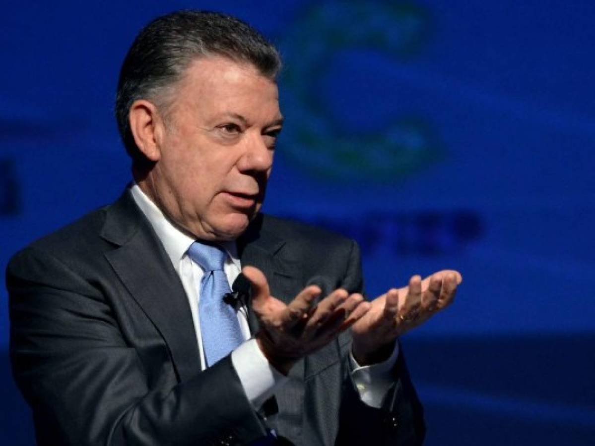 Presidente de Colombia condena en Lima asesinato de periodistas ecuatorianos