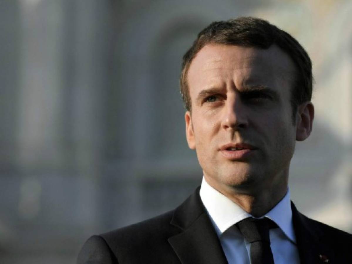 El presidente francés denuncia a un fotógrafo por 'acoso' por seguirlo