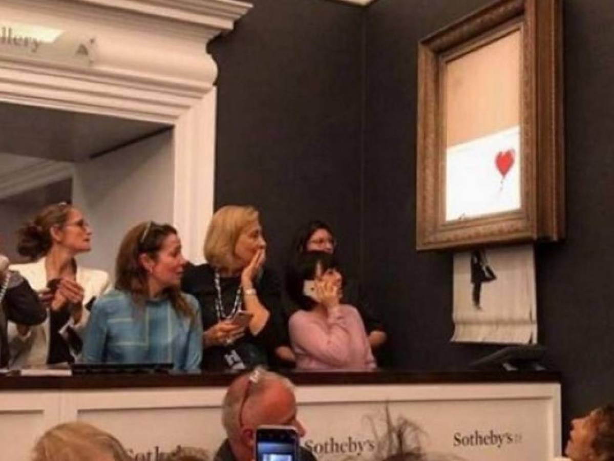Obra de arte de Banksy se autodestruye tras ser vendida 