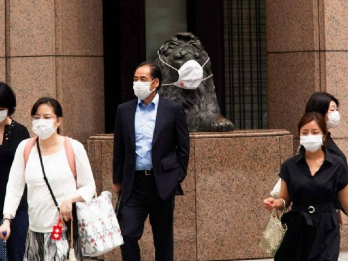 Japón amplía el estado de emergencia tras autorizar vacunas