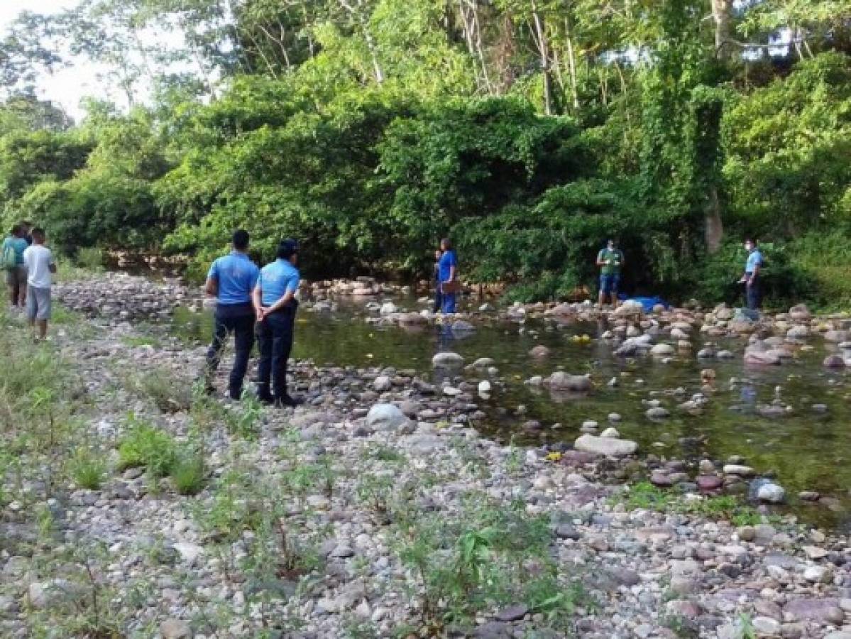 Semienterrado y con signos de tortura hallan cuerpo en el Río Danto de La Ceiba