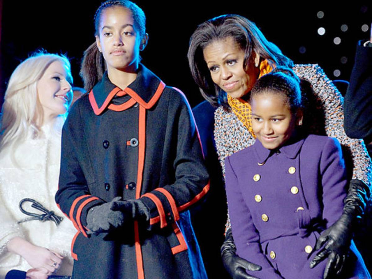 Los Obama iluminan árbol de Navidad