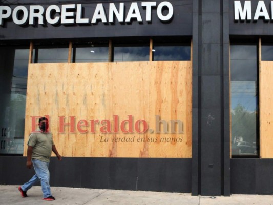 Comercios de la capital de Honduras toman medidas de protección previo a las elecciones (Fotos)