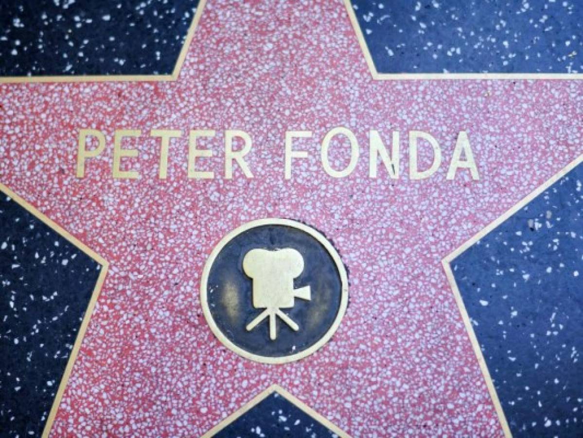 View of actor Peter Fonda's star on the Walk of Fame in Hollywood on August 16, 2019. - US actor Peter Fonda, the star of the classic 1969 road movie 'Easy Rider,' died Friday aged 79 from respiratory failure due to lung cancer, his family said. (Photo by VALERIE MACON / AFP)