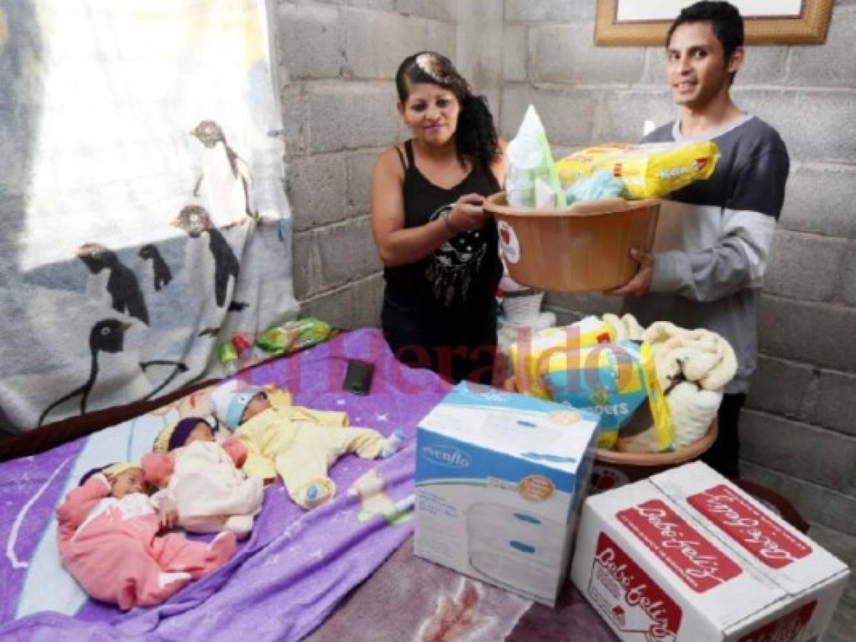 Pro-Vida dona canastas con productos a trillizos en la capital de Honduras