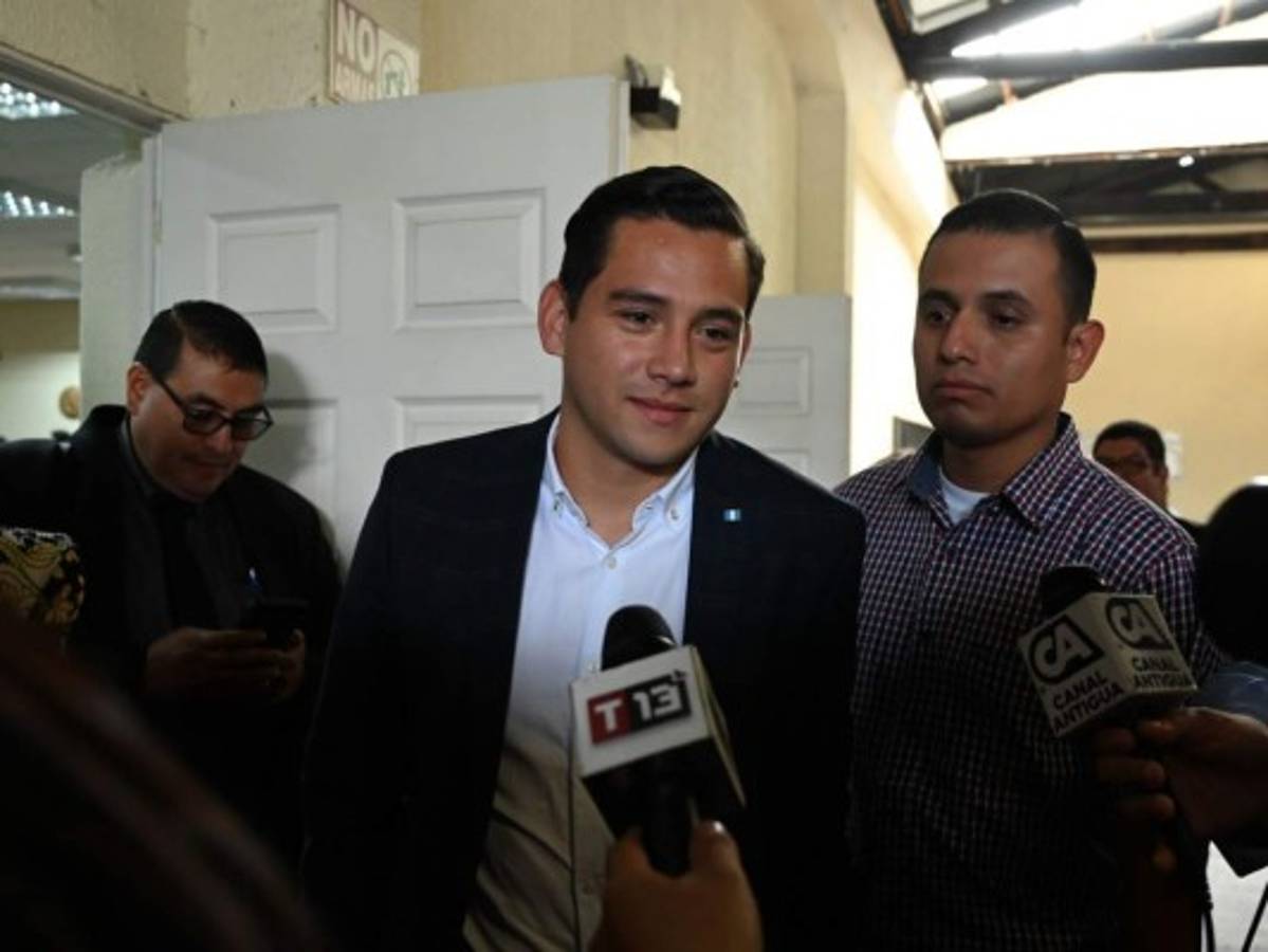 Absuelven a hijo y hermano de presidente de Guatemala