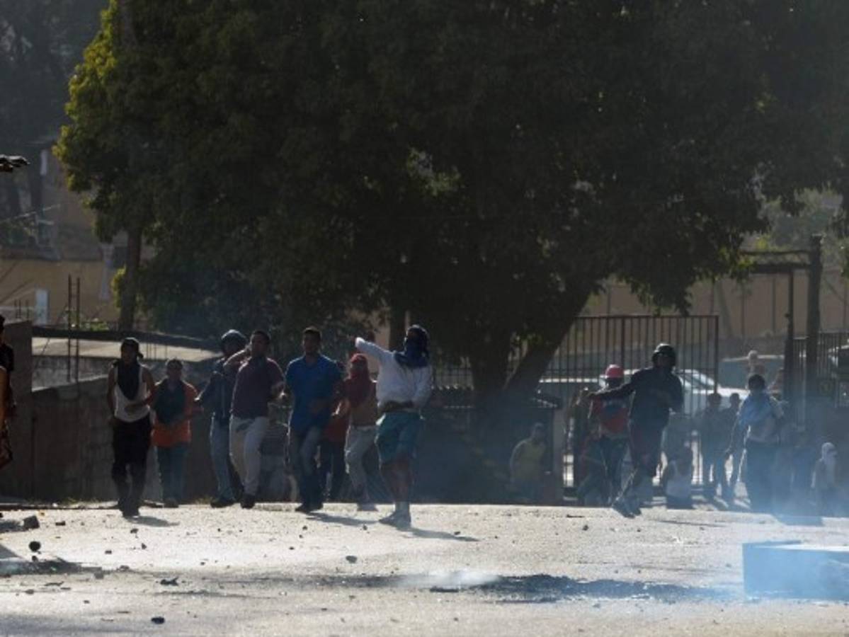 Cuatro muertos en disturbios previos a marchas en Venezuela
