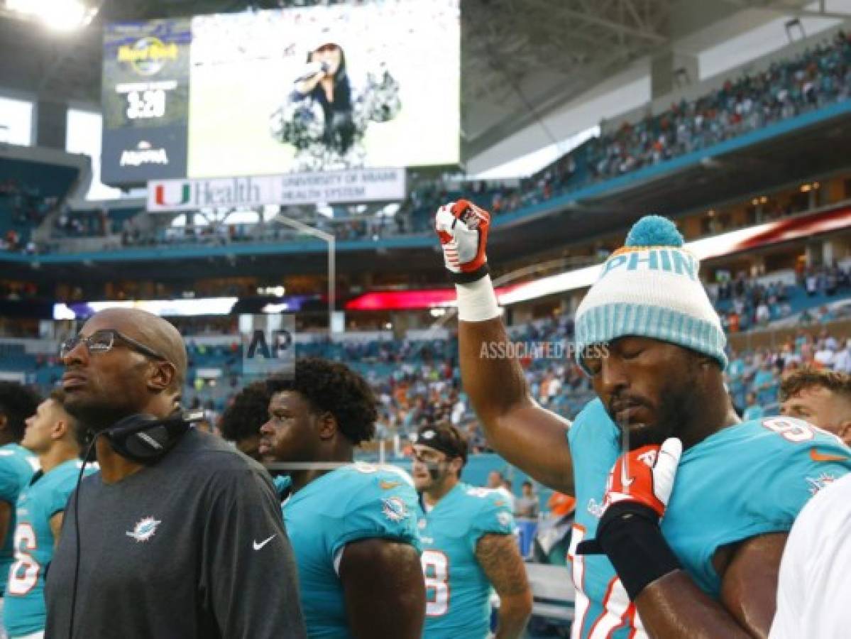 NFL: Jugadores protestant durante himno, Trump pide sanciones