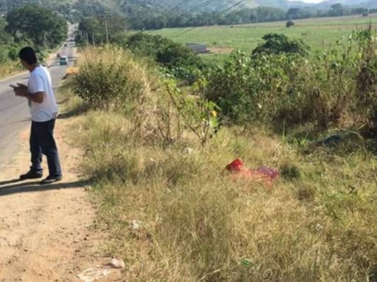 Hallan cadáver encostalado a la orilla de una carretera en San Pedro Sula