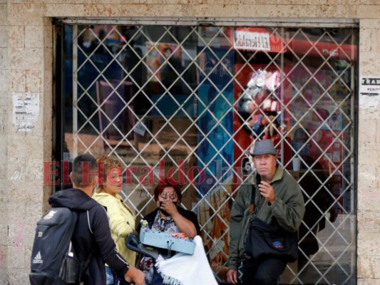 Comercios de la capital de Honduras toman medidas de protección previo a las elecciones (Fotos)