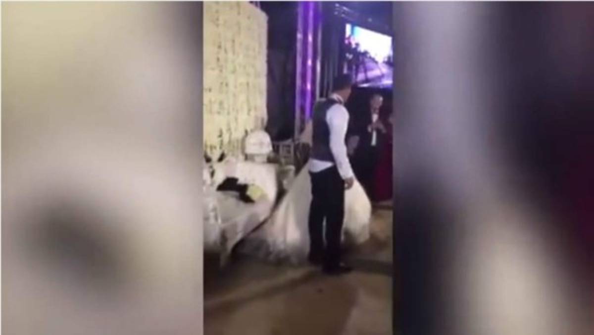 Novia casi muere ahogada el día de su boda al lanzarse a una piscina a celebrar