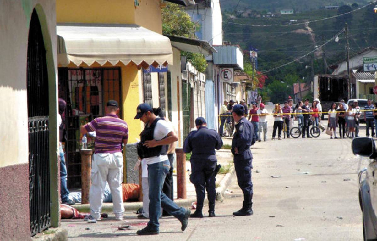 Dos jóvenes asesinados frente a armería en Siguatepeque