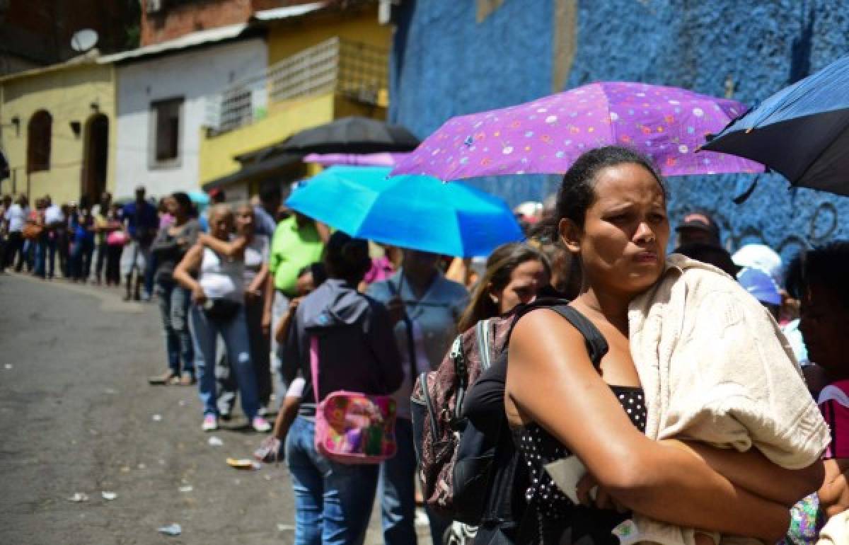 Venezuela extiende por dos semanas jornada laboral de dos días  