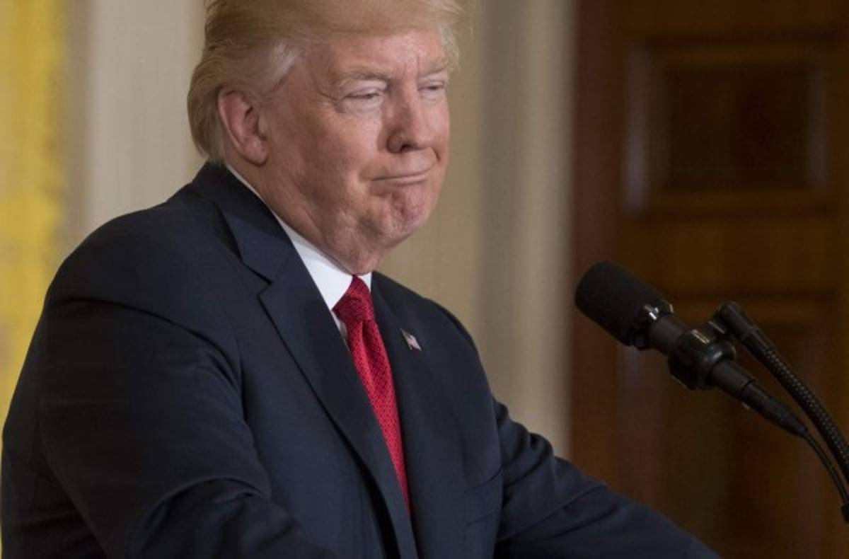 US President Donald Trump speaks alongside Italian Prime Minister Paolo Gentiloni (L) during a press conference in the East Room at the White House in Washington, DC, April 20, 2017. / AFP PHOTO / SAUL LOEB
