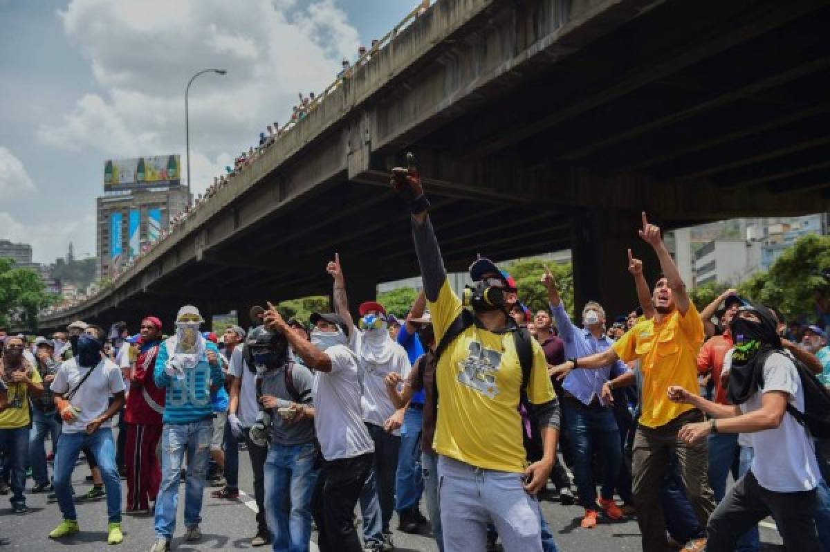 Las imágenes más impactantes de la 'madre de las marchas' en Venezuela