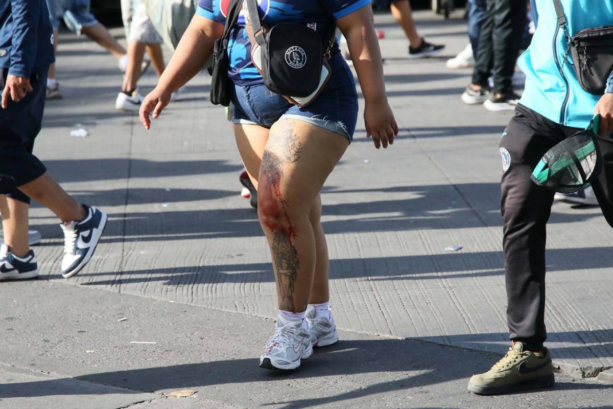 Oficial: Cantidad de casquillos de bala, heridos y daños tras pelea de barras de Olimpia y Motagua