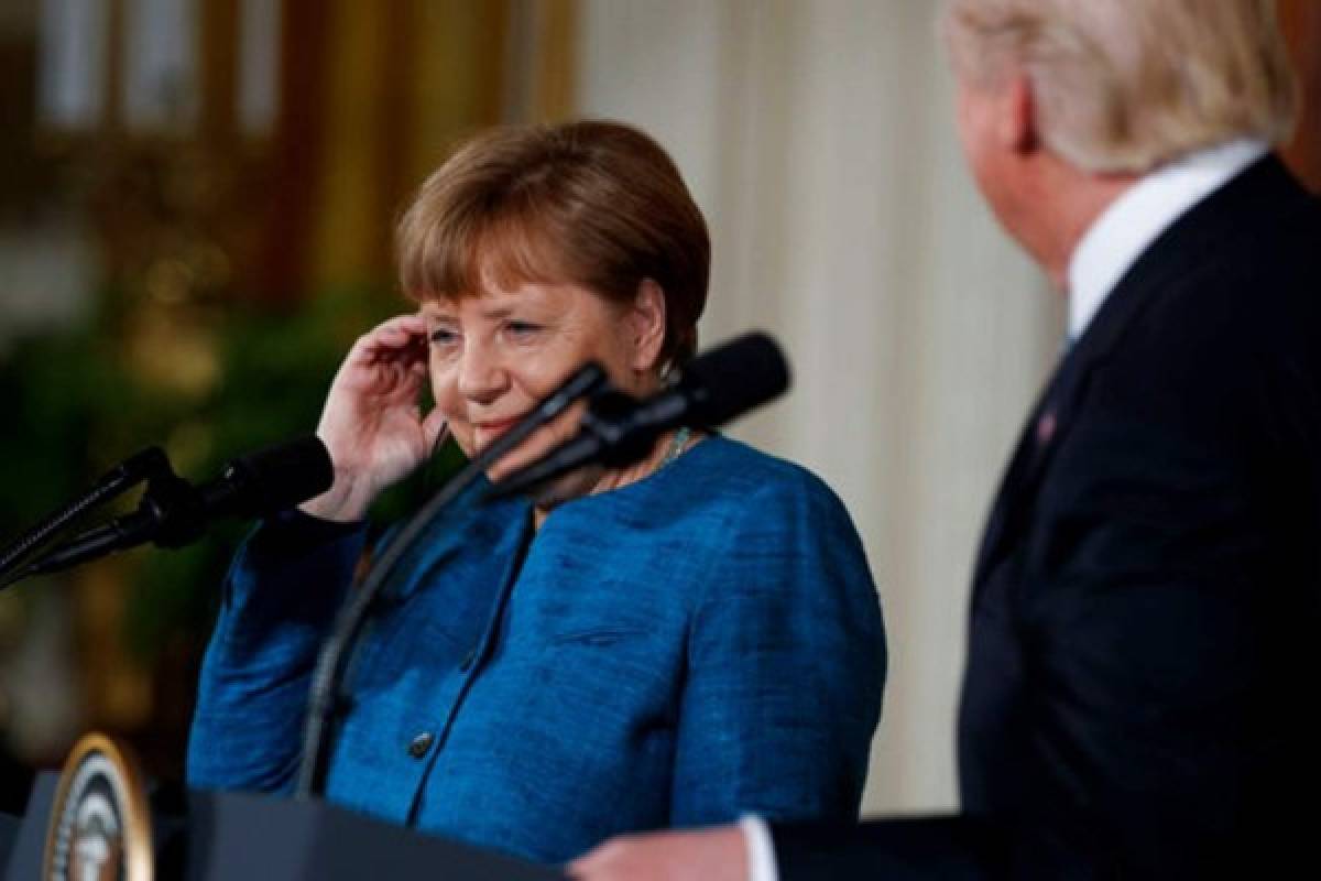 Donald Trump ignora y le niega apretón de manos a Angela Merkel