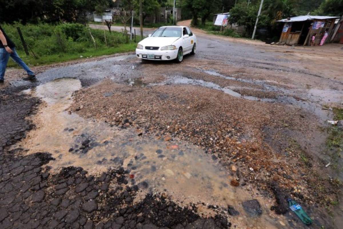 Repararán las vías de asfalto dañadas por las lluvias en la capital de Honduras